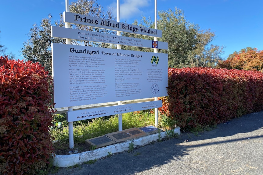 A sign explaining the history of the bridge.