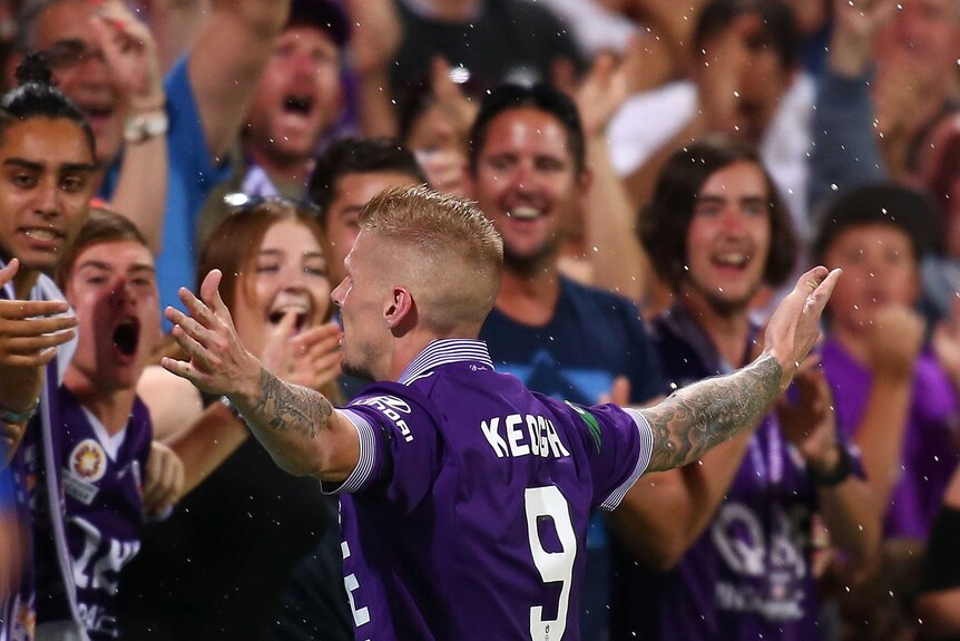 Andy Keogh celebrates a goal for Perth Glory