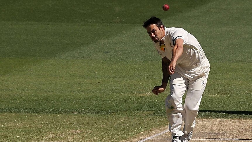 Australia's Mitchell Johnson bowls on day four of first Test against India at Adelaide Oval.