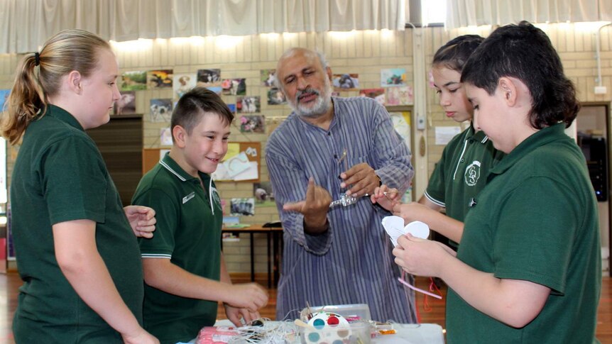 Toymaker Arvind Gupta in a workshop for students at Charnwood-Dunlop School, ACT.