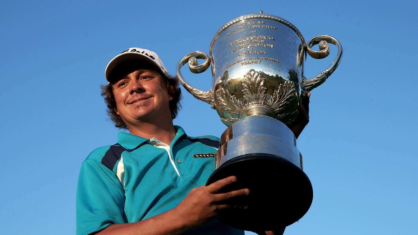 Jason Dufner poses with the Wanamaker trophy