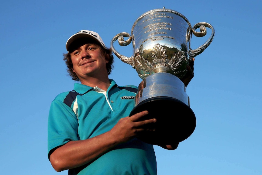 Jason Dufner poses with the Wanamaker trophy