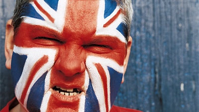 Portrait of a Man With the Union Jack Painted on His Face (Getty Images)