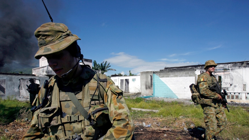 UN soldiers from Australia patrol in Dili, the capital of East Timor.