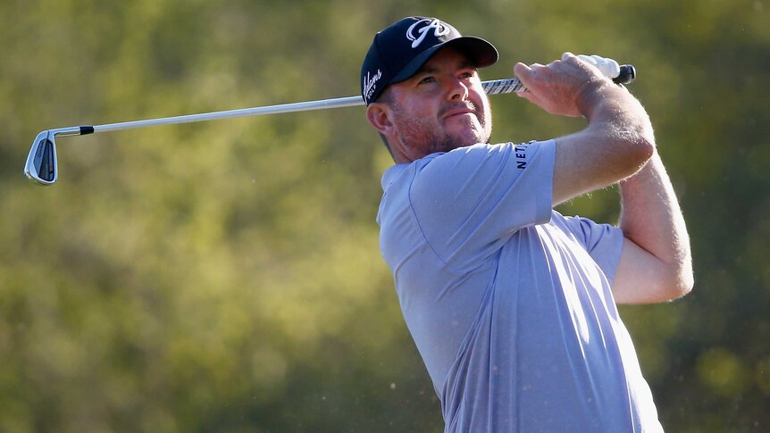 Robert Garrigus hits a shot on the 17th hole in the second round of the Tampa Bay Championship.