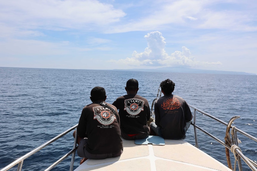 Looking out over the bow of a boat.