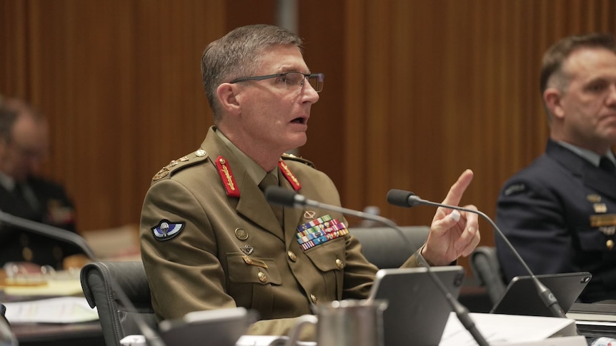 Defence Chief Angus Campbell speaking in military uniform. 