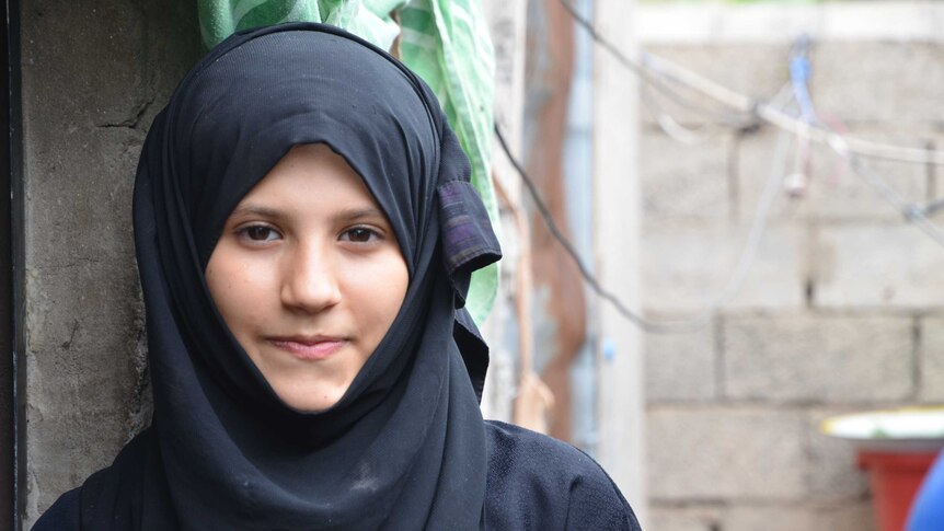 Young girl in a black hijab