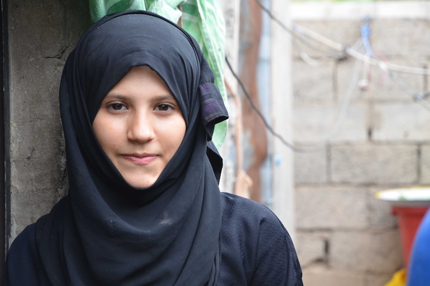 Young girl in a black hijab