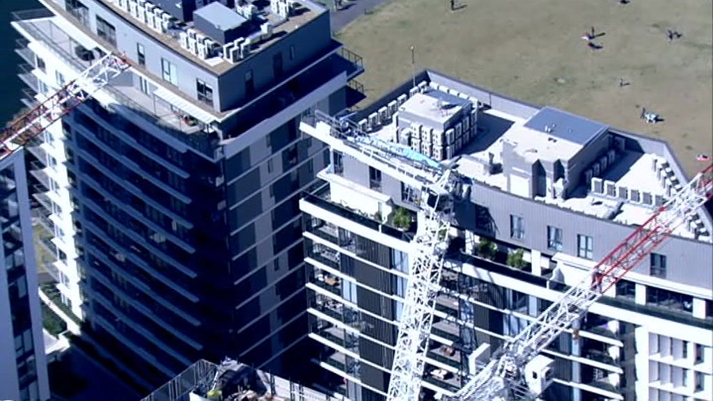 Crane collapses onto apartment block at Wolli Creek residents