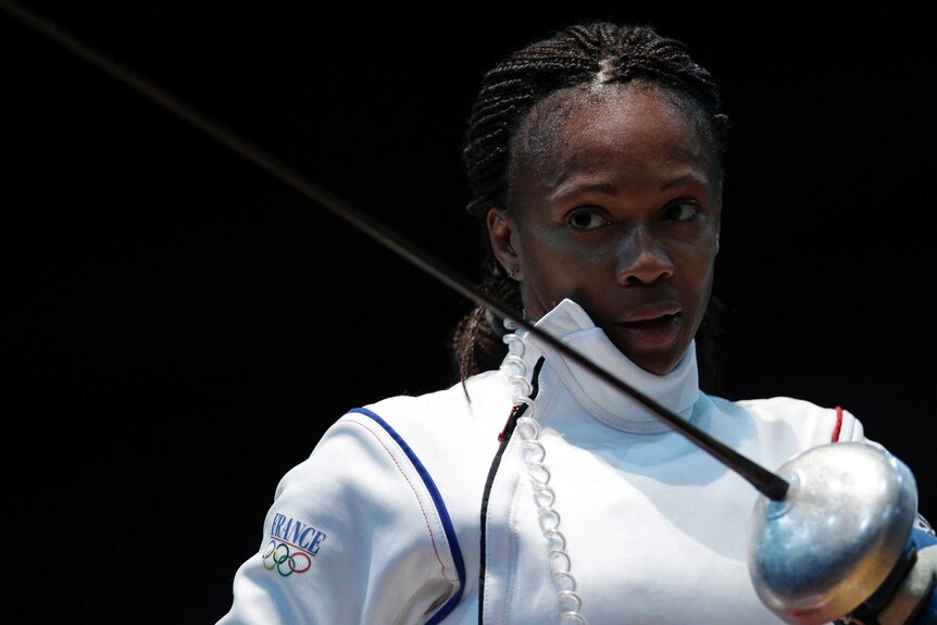 France's Laura Flessel-Colovic reacts after being defeated.