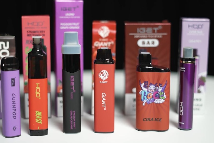 vaping products lined up on a counter