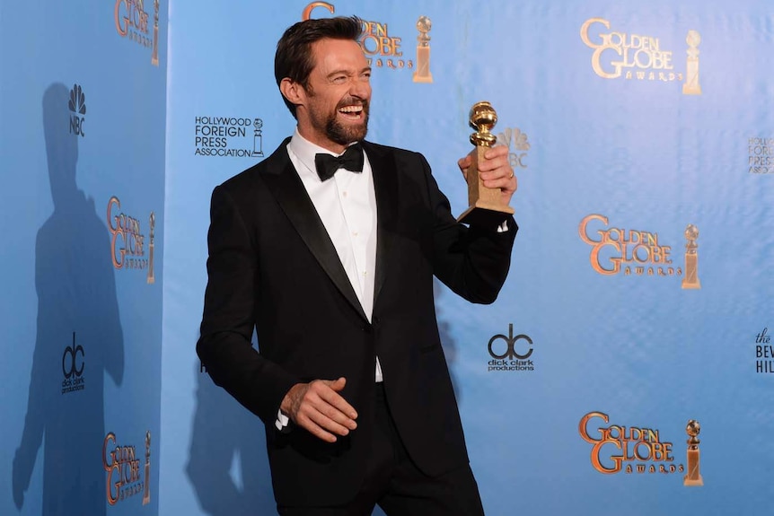 Hugh Jackman shows off his best actor Golden Globe