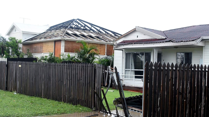 Two houses in Bowen with roofs ripped off.