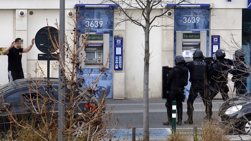 A man who had taken two hostages in a post office surrenders to French police