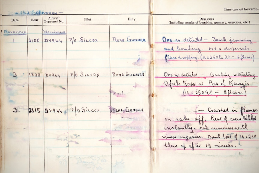 A double page from a flight logbook with notes including details of a bombing raids and a crash.