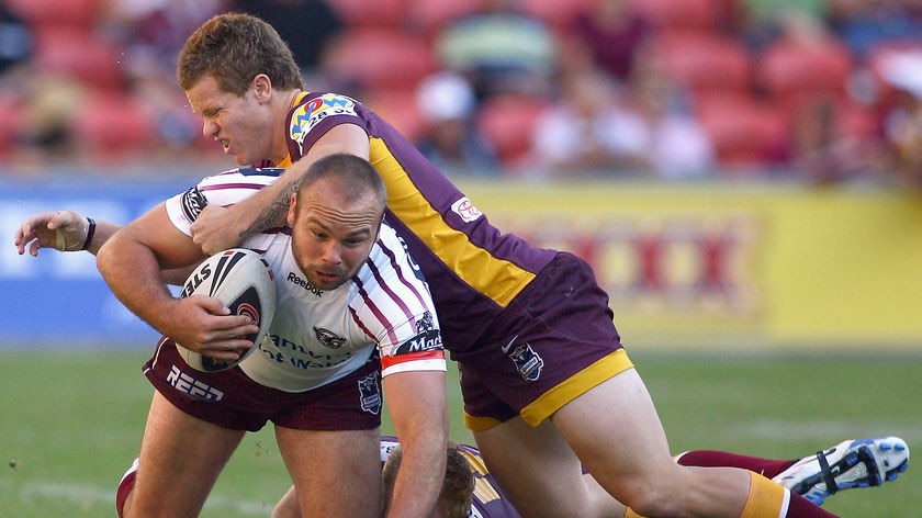Stewart confronts the Broncos' defence