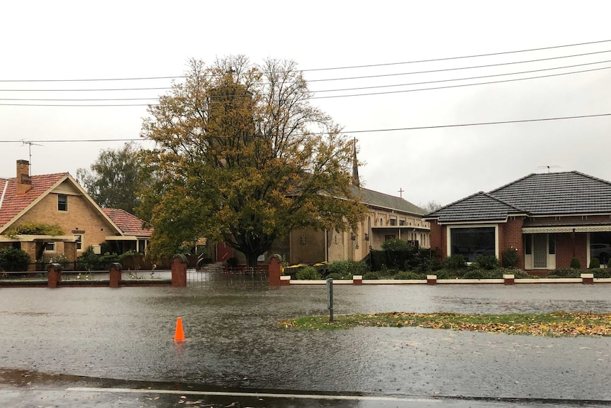 Water floods a residential street in Lake Wendouree.