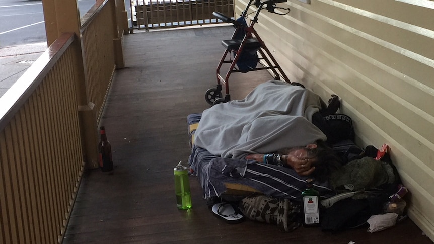 Man sleeping on a verandah