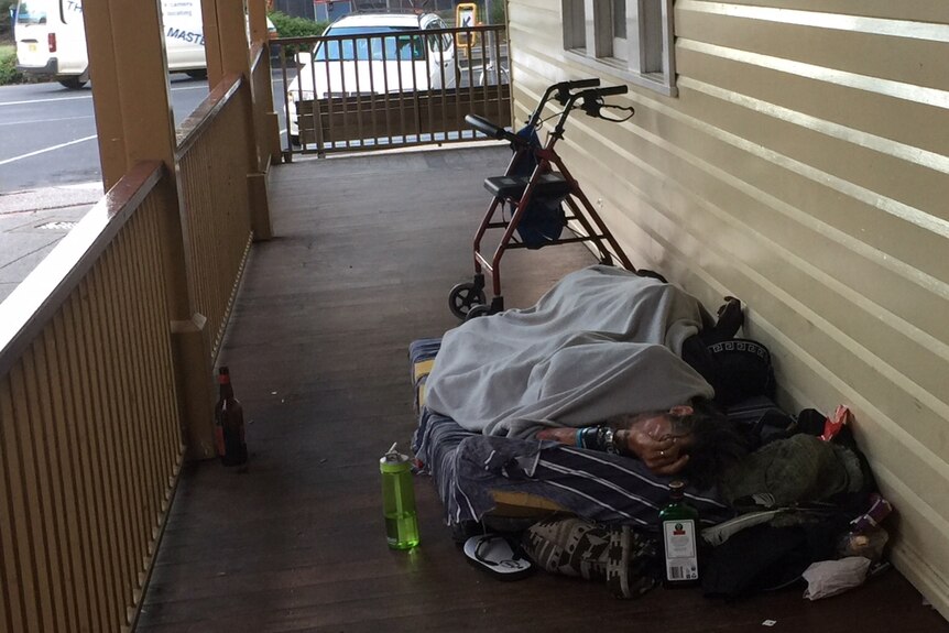 Man sleeping on a verandah