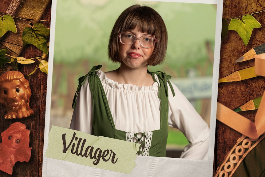 A girl dressed in a medieval costume.