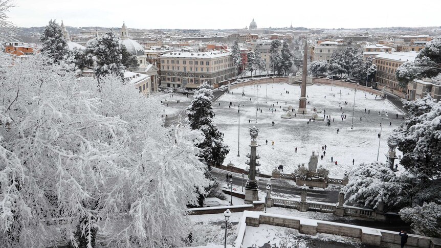 The People's Square in Rome is seen covered in snow during a  heavy snowfall.