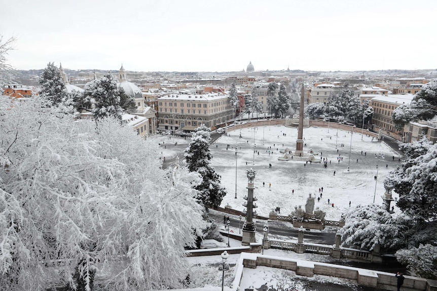 The People's Square in Rome is seen covered in snow during a  heavy snowfall.