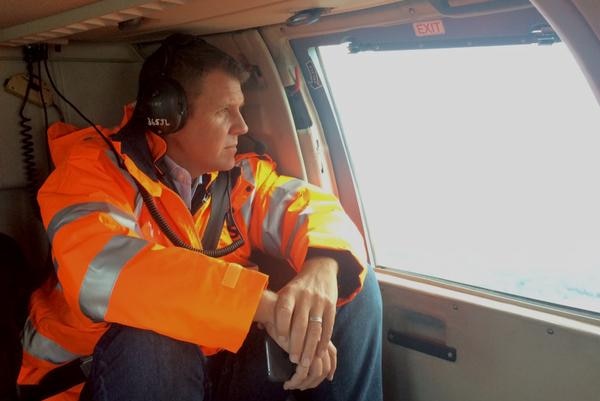 NSW Premier Mike Baird touring the areas of storm devastation via helicopter in the Hunter region.