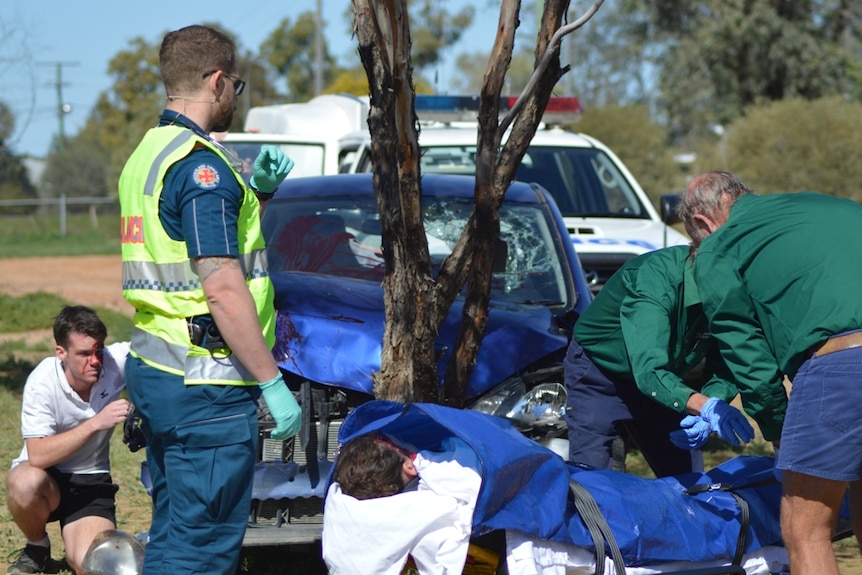 A dramatised scene of a car accident as part of an RACQ awareness campaign.