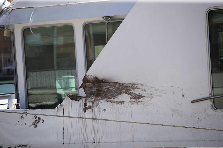 A partial view of the tourist boat that was struck by a cruise line ship in Venice