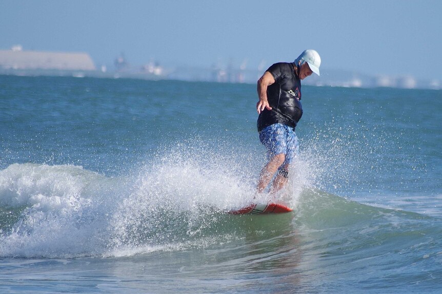 Jack Williams surfing