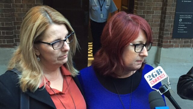 Alison McKenzie (left) and his sister Fran Pearce solemnly speak to the media outside court.