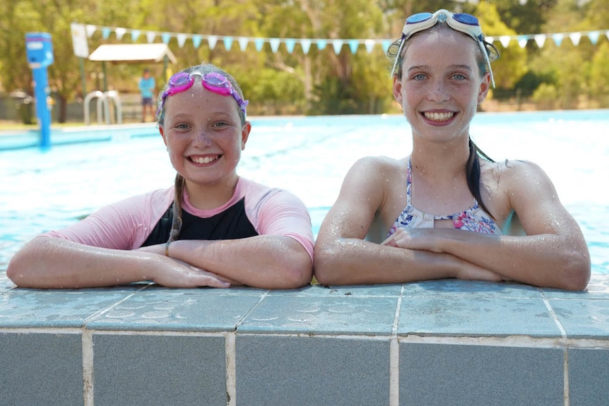 Murrurundi Public School co-captains rest beside the local pool.