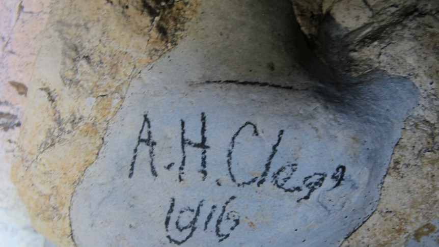 signature on cave wall