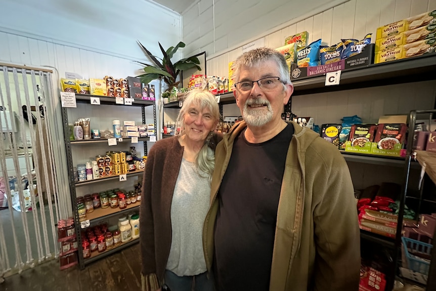 John and Lorrell Woolhouse at their op shop in Dorrigo 