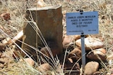 A photo showing the plaque marking the grave of a five-month-old boy who died in 1900.