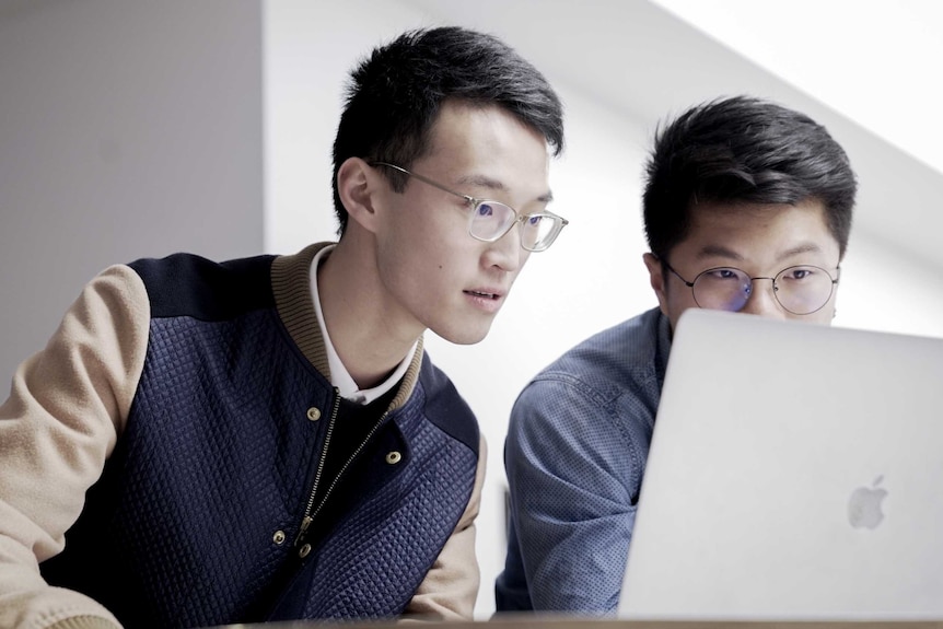 Rico Peng studies with friend Anthony Hou at UTS Business School.