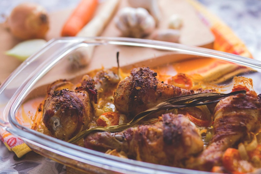 Chicken in an oven tray.