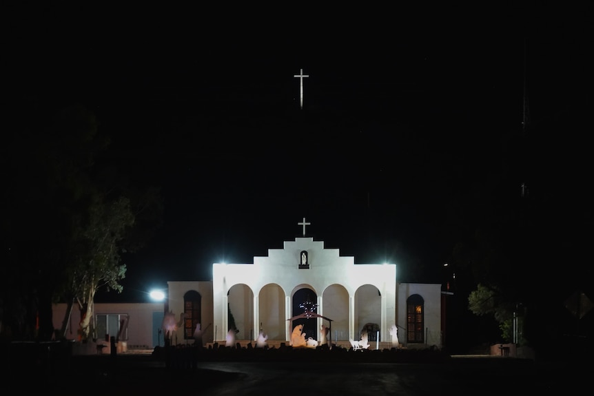  church illuminated at night