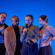 Four actors on stage in 'Die Redaktion'