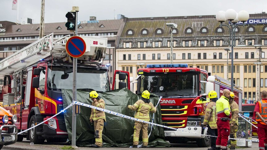 Rescue services attend the scene after the multiple stabbing incident in Finland.