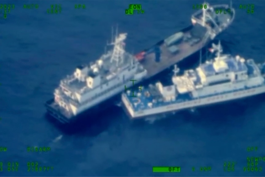 An aerial view of two ships at sea close together