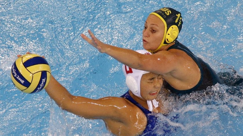 Australia's Melissa Rippon, right, fights for the ball with China's Gao Ao