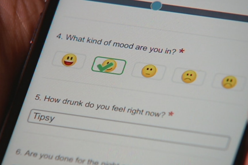 A VicHealth app on the screen of a smartphone which aims to reduce binge drinking among university students.