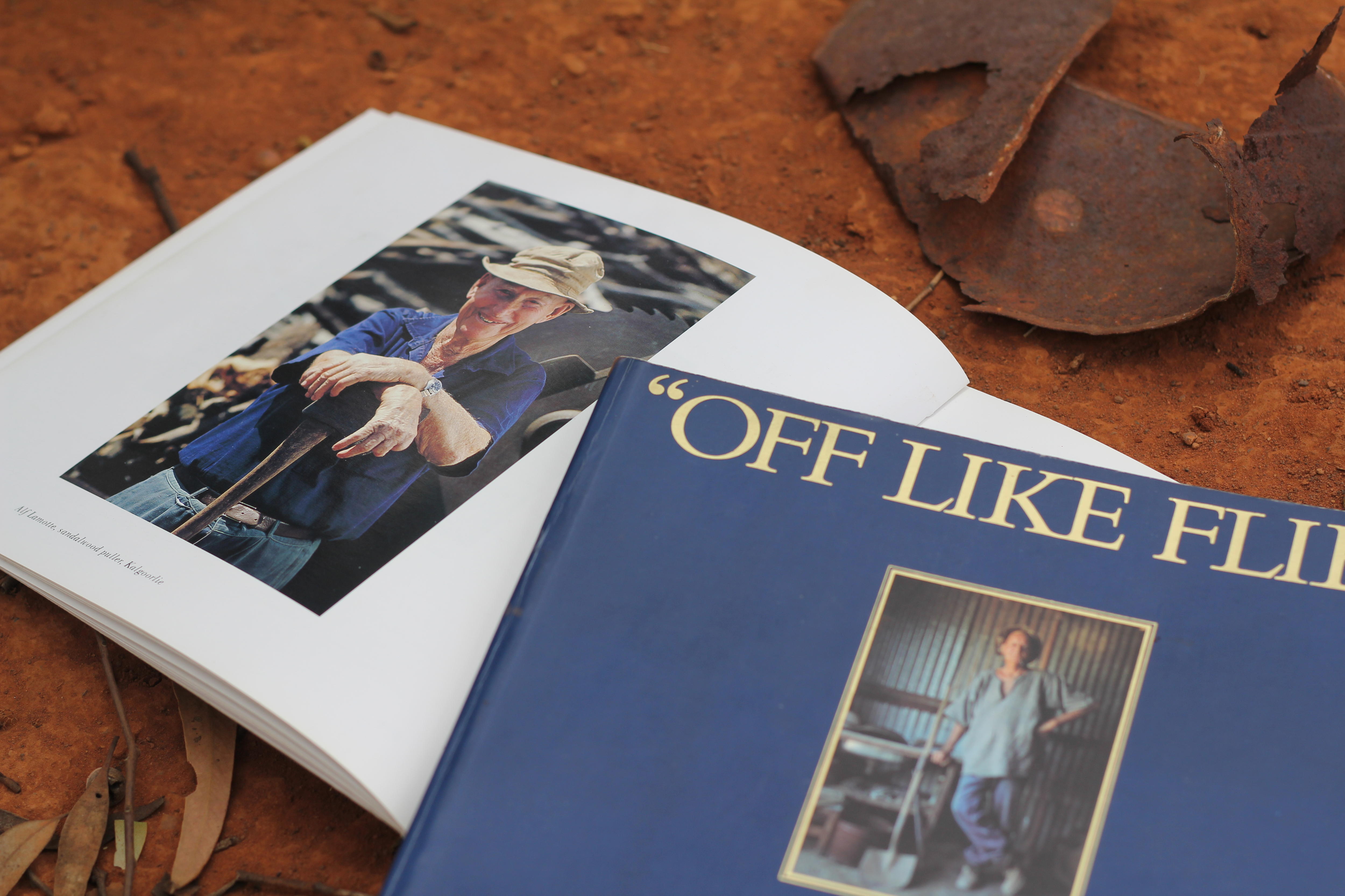 two books in red dirt