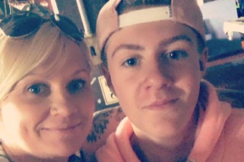 Mother and son pose for selfie picture
