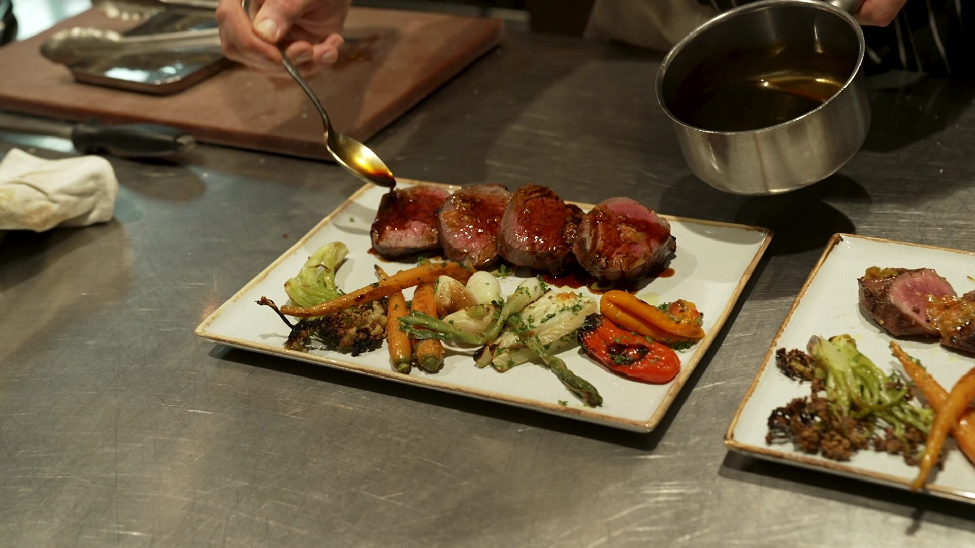 Photo of roast meat and vegetables.