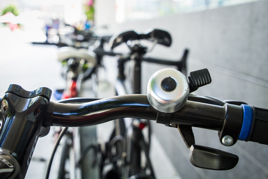 A bike bell fitted to a stationary bike at South Bank in Brisbane.