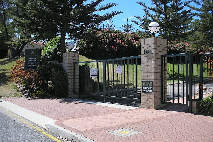 The front gate at Penrhos College in Perth surrounded by trees.