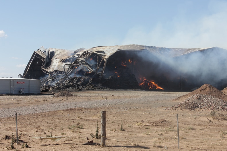 A tin shed burns